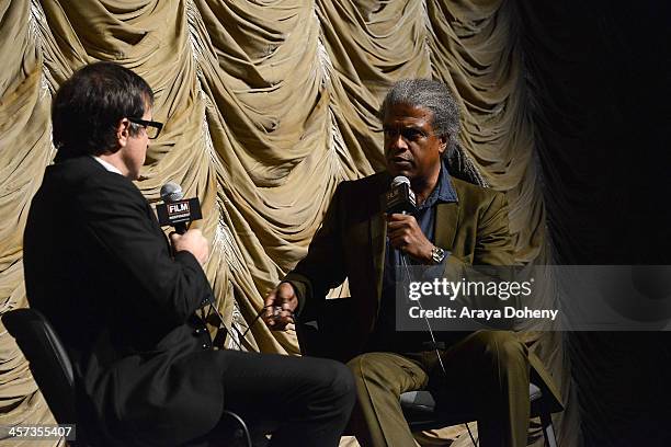 David O. Russell and Elvis Mitchell attend the Film Independent at LACMA screening & Q+A of American Hustle at Bing Theatre At LACMA on December 16,...