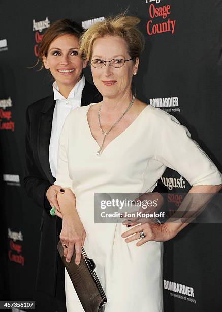 Actress Julia Roberts and actress Meryl Streep arrive at the Los Angeles Premiere "August: Osage County" at Regal Cinemas L.A. Live on December 16,...