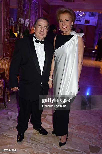 Paul Loup Sulitzer and Monique Raymond attend the 'The Best 2013' Ceremony Awards 37th Edition at the Salons Hoche on December 16, 2013 in Paris,...