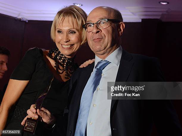 Jacques Pessis and a guest attend the 'The Best 2013' Ceremony Awards 37th Edition at the Salons Hoche on December 16, 2013 in Paris, France.