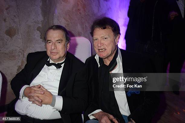 Paul Loup Sulitzer and a guest attend 'The Best 2013' Ceremony Awards 37th Edition at the Salons Hoche on December 16, 2013 in Paris, France.