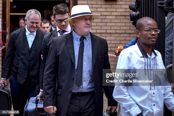 Henke Pistorius, father of Oscar leaves the North Gauteng High Court after the fifth day of sentencing of Oscar Pistorius on October 17, 2014 in...