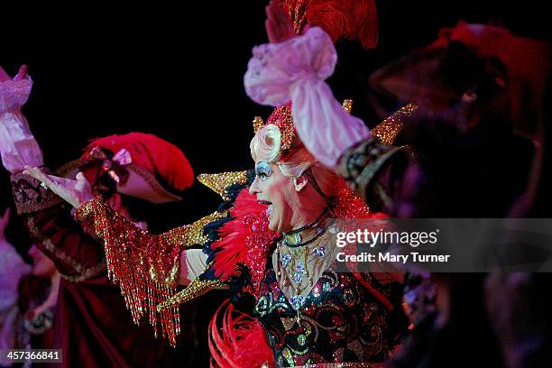 Pantomime Dame Nigel Ellacott performs on the stage at Venue Cymru Theatre as Queen Blodwyn in Sleeping Beauty on December 14, 2013 in Llandudno,...