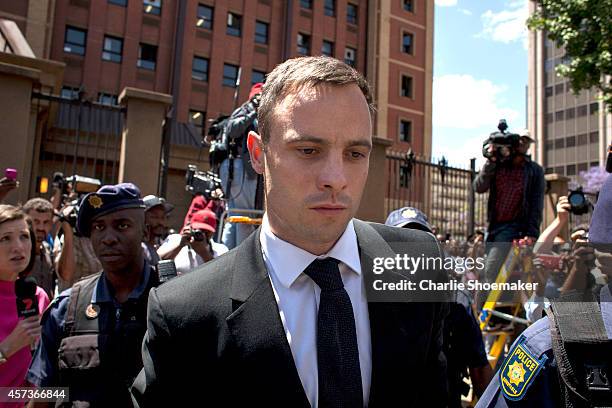 Oscar Pistorius leaves the North Gauteng High Court after the fifth day of sentencing on October 17, 2014 in Pretoria, South Africa. The defence and...