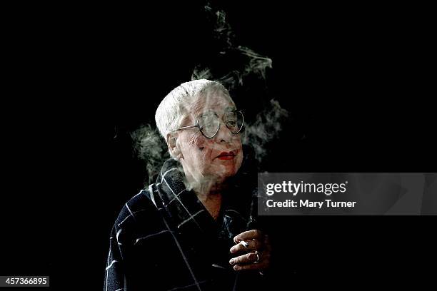 Kenneth Alan Taylor, takes a cigarette break outside his dressing room at Nottingham Playhouse, before going on stage as Dame Daisy in Jack and The...