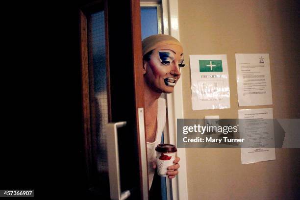 David Ball puts his head around a dressing room door before going on stage at the Churchill Theatre on December 12, 2013 in Bromley, England. David,...