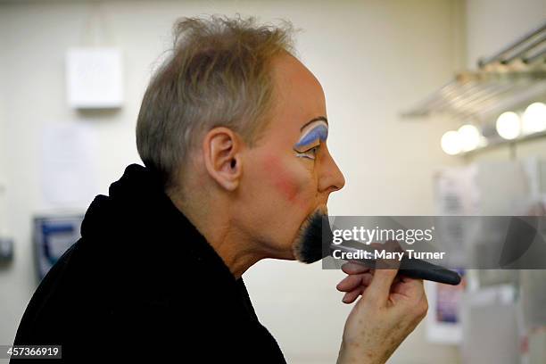 Pantomime Dame Nigel Ellacott does his make-up in his dressing room at Venue Cymru Theatre where he is performing as Queen Blodwyn, in Sleeping...