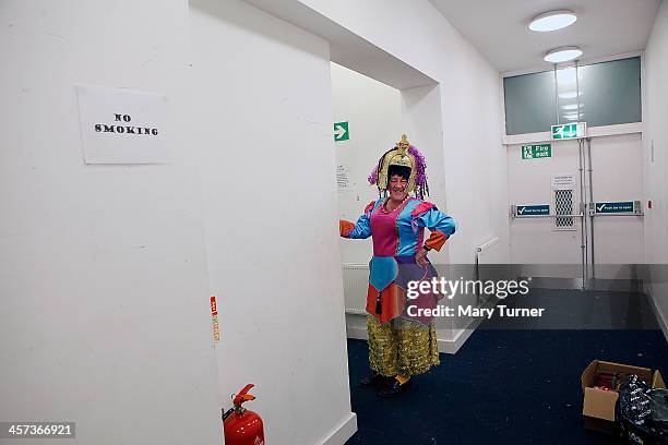 Pantomime Dame Pete Duffy poses as he waits to go on stage in a messy corridor, during rehearsals for Alladdin at the Rhodes Arts Complex on December...