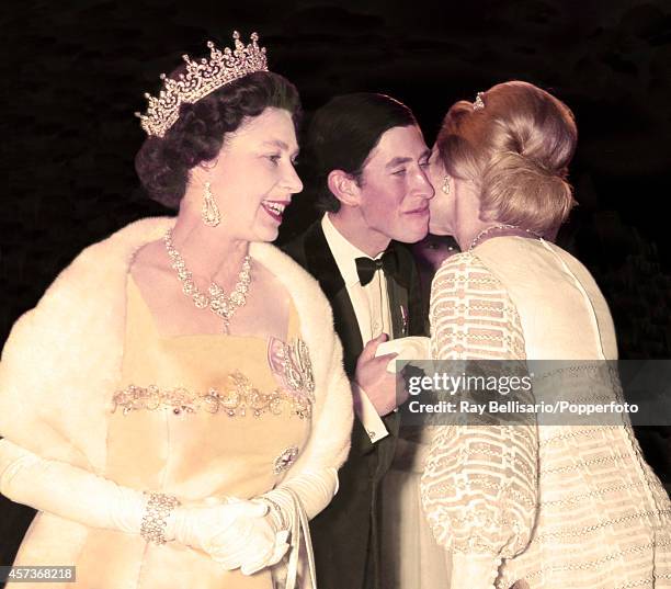 Queen Elizabeth II, Prince Charles and the Duchess of Kent arrive at the Dominion Theatre in London for a film premiere on 20th October 1969.