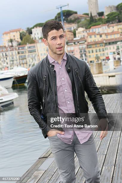 Nick Jonas poses for "Kingdom" Photocall during MIPCOM 2014 on October 14, 2014 in Cannes, France.
