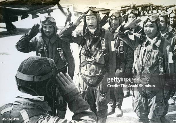 Pilots salute prior to their Kamikaze attack at Chiran Air Base in April 1945 in Chiran, Kagoshima, Japan.