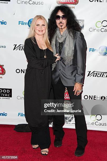 Writer/director Regina Russell and rock drummer Frankie Banali arrive at the Opening Night Gala of the 2014 Hollywood Film Festival at ArcLight...