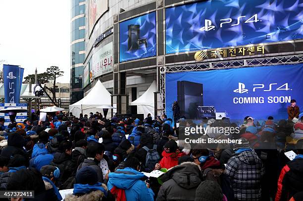 Gamers wait in line ahead of the launch of Sony Corp.'s PlayStation 4 game console in Seoul, South Korea, on Tuesday, Dec. 17, 2013. Sony is...