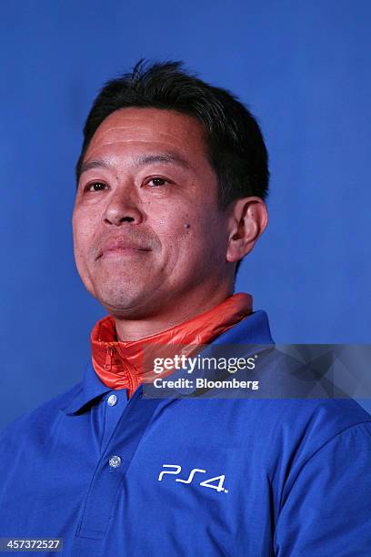 Hiroyuki Oda, deputy president of Sony Computer Entertainment Japan Asia, attends the launch event for Sony Corp.'s PlayStation 4 game console in...