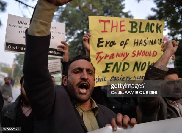 Pakistani activists shout slogans during a protest against the execution of Bangladeshi Islamist leader Abdul Quader Molla, outside the High...