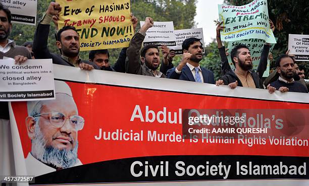 Pakistani activists shout slogans during a protest against the execution of Bangladeshi Islamist leader Abdul Quader Molla, outside the High...