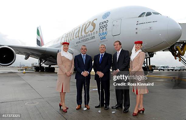 European Tour professional Paul McGinley of Ireland, Nigel Hopkins, Executive Vice President, Service Departments of Emirates Group and George...