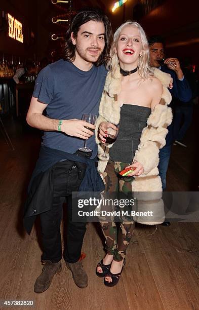 Ben Kustow and Harriet Verney attend the VIP Gala Screening of "Marc Quinn: Making Waves" at the Ham Yard Hotel on October 17, 2014 in London,...