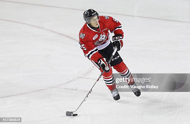 Blake Siebenaler of the Niagara Ice Dogs skates with the puck during an OHL game between the Belleville Bulls and the Niagara Ice Dogs at the...