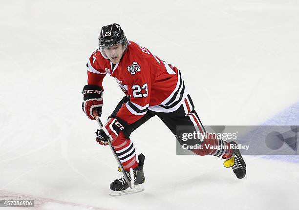 Johnny Corneil of the Niagara Ice Dogs skates during an OHL game between the Belleville Bulls and the Niagara Ice Dogs at the Meridian Centre on...