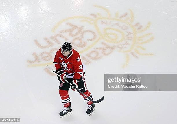 Brian Brosnan of the Niagara Ice Dogs skates during an OHL game between the Belleville Bulls and the Niagara Ice Dogs at the Meridian Centre on...