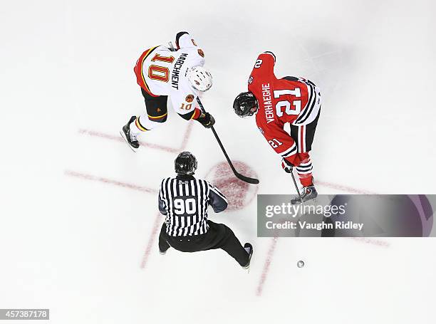 Carter Verhaeghe of the Niagara Ice Dogs and Jake Marchment of the Belleville Bulls face-off in an OHL game at the Meridian Centre on October 16,...