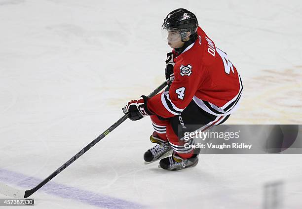 Vince Dunn of the Niagara Ice Dogs skates during an OHL game against the Belleville Bulls at the Meridian Centre on October 16, 2014 in St...
