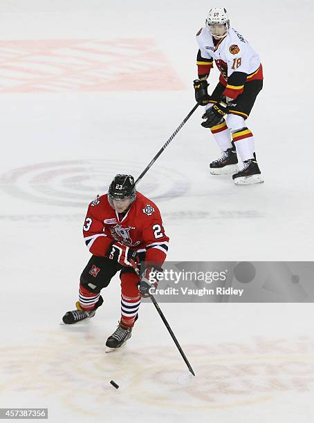 Johnny Corneil of the Niagara Ice Dogs skates up the ice during an OHL game against the Belleville Bulls at the Meridian Centre on October 16, 2014...
