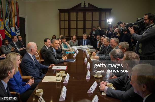 President Barack Obama and Vice President Joe Biden meet with executives from leading tech companies to discuss progress with HealthCare.gov at the...