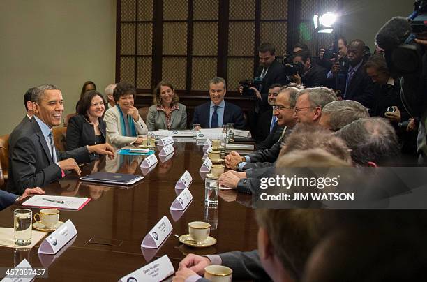 President Barack Obama meets with executives from leading tech companies to discuss progress with HealthCare.gov at the White House in Washington,...