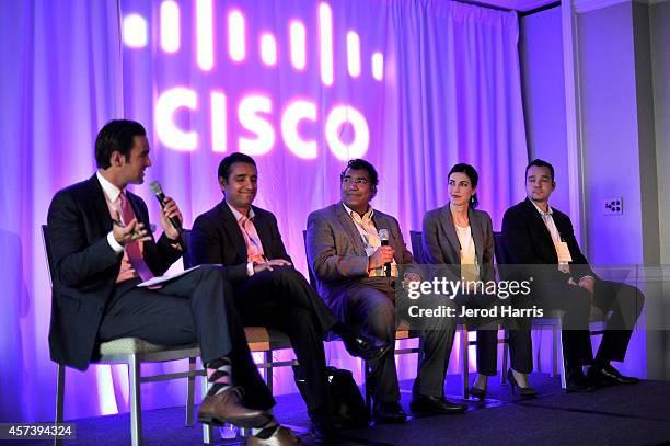 Reporter Elex Michaelson, Head of CISCO's IOT Verticals Strategy Pavan Singh, CEO of Nuviso Kishore Kumar, Director of Business Development for...