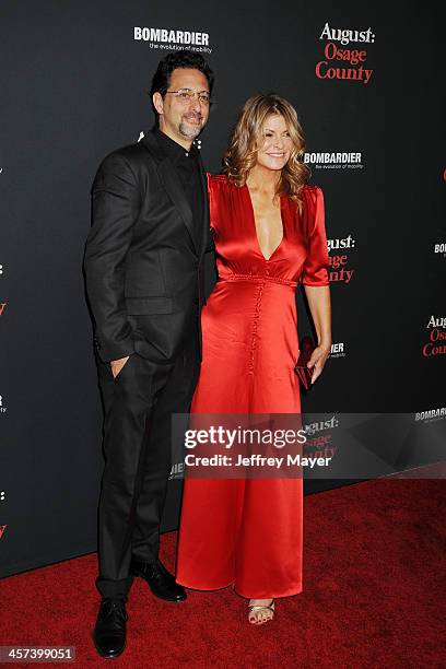 Producer Grant Heslov and wife Lysa Hayland arrive at the 'August: Osage County' - Los Angeles Premiere at Regal Cinemas L.A. Live on December 16,...