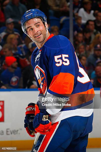 Johnny Boychuk of the New York Islanders skates against the Carolina Hurricanes at Nassau Veterans Memorial Coliseum on October 11, 2014 in...