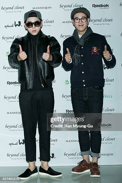 Zico and P.O of South Korean boy band Block B pose for photographs at the Beyond Closet show as part of Seoul Fashion Week S/S 2015 at DDP on October...