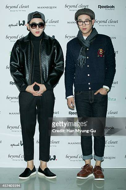 Zico and P.O of South Korean boy band Block B pose for photographs at the Beyond Closet show as part of Seoul Fashion Week S/S 2015 at DDP on October...