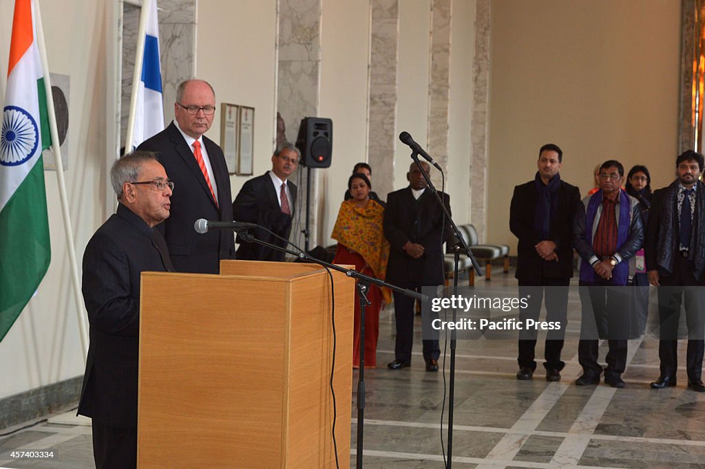 The President of India Pranab Mukherjee (R), Mr Eero...