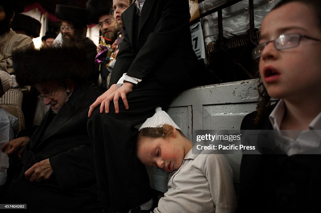 Ultra-Orthodox Jewish children fall asleep in the Synagogue...