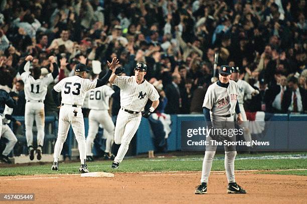 Tino Martinez of the New York Yankees runs the bases during Game One of the World Series against the San Diego Padres on October 17, 1998 at Yankee...