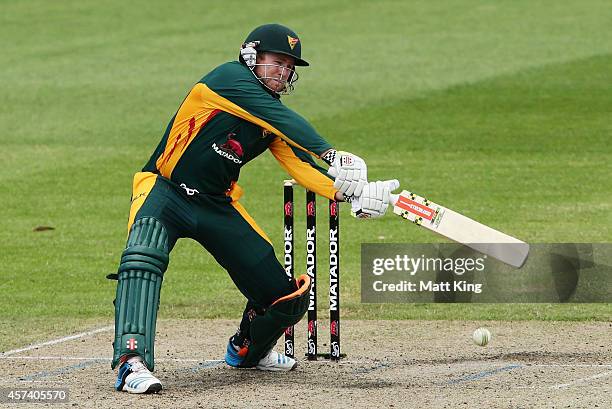 Ben Dunk of the Tigers plays on the off side during the Matador BBQs One Day Cup match between Queensland and Tasmania at North Sydney Oval on...