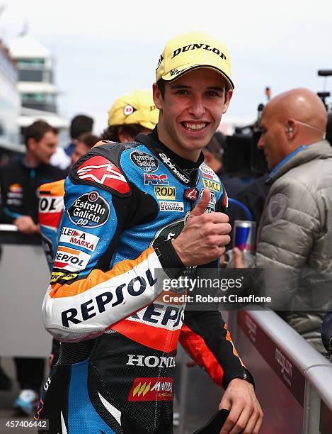 Alex Marquez of Spain and rider of the Estella Galica O.O Honda celebrates after taking pole position in the Moto3 qualifying session for the 2014...
