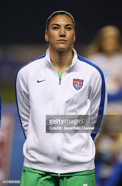 Hope Solo of the United States stands during the National Anthem before a match against Guatemala during the 2014 CONCACAF Women's Championship at...