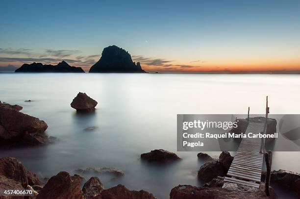 Sunset in Cala d´Hort with Es Vedrá islet at the back.