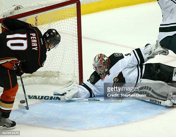 Corey Perry of the Anaheim Ducks scores the game winning goal in the third period past goalie Darcy Kuemper of the Minnesota Wild at Honda Center on...