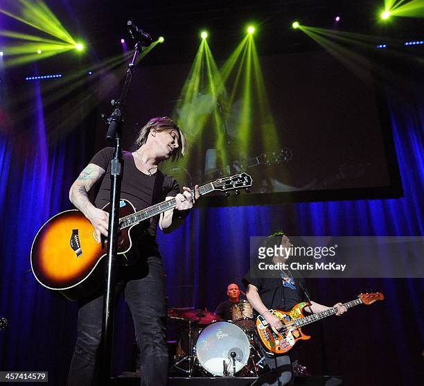 John Rzeznik, Mike Malinin, and Robby Takac of Goo Goo Dolls perform during the 2013 Star 94 Jingle Jam at Arena at Gwinnett Center on December 16,...