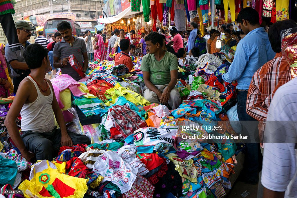 Children's dresses are on sale in Burra Bazaar. Burra Bazaar...