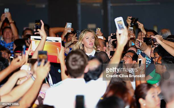 Maria Sharapova of Russia arrives at the Marina Bay Sands shopping centre for the draw ceremony prior to the start of the BNP Paribas WTA Finals at...