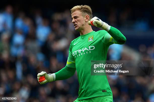 Goalkeeper Joe Hart of Manchester City celebrates after his team go 4-1 ahead during the Barclays Premier League match between Manchester City and...