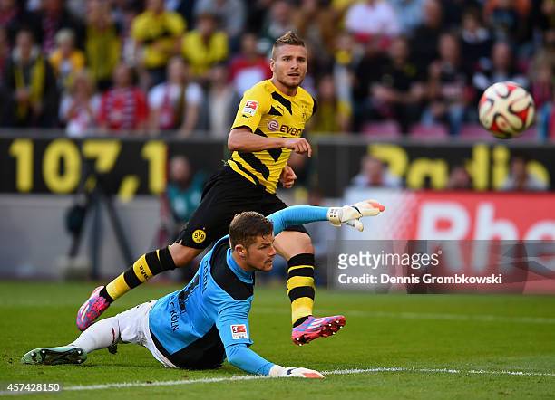 Immobile of Borussia Dortmund scores their first goal past Timo Horn of 1. FC Koeln during the Bundesliga match between 1. FC Koeln and Borussia...