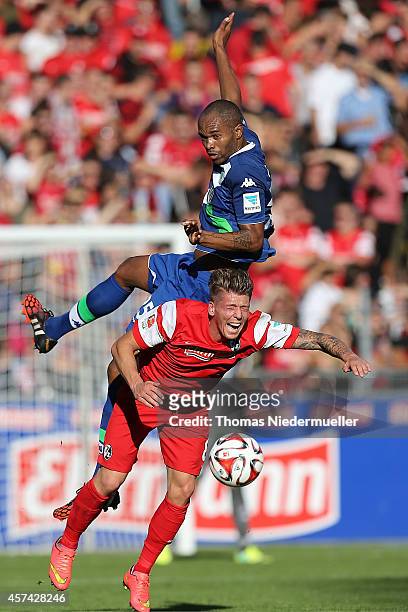 Mike Frantz of Freiburg fights for the ball with Naldo of Wolfsburg during the Bundesliga match between SC Freiburg and VfL Wolfsburg at MAGE SOLAR...