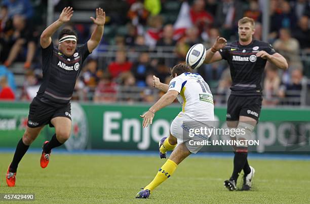 Clermont's fly-half from France Camille Lopez kicks a drop-goal to make the score 13-13 during the European Rugby Champions Cup match between...